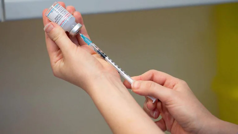 UK becomes first nation to approve Omicron vaccine